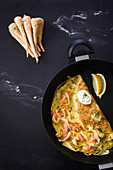 Omelette with smoked trout and parsnips
