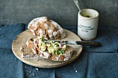 Potato and ham spread with spring onions on light country bread