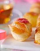 Pastry lips with icing sugar (close-up)