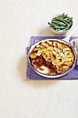 Slow-cooked lamb with scalloped potatoes