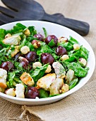 Mixed leaf salad with cherries, hazelnuts and croutons