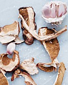 Dried, sliced porcini mushrooms and fresh garlic