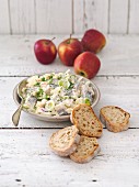 Herring salad with apple, leek, onions and sour cream