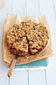 Flourless oat cake with apples and plums