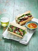 Baguette sandwiches with beef, coriander and chilli sauce