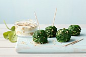 Spinach balls with sesame seeds and a miso dip