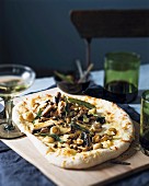 Pizza with mushrooms and sage