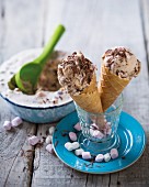 Home-made ice cream with chocolate spread, marshmallows and cookies