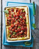 A tomato and basil puff pastry tart