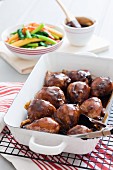 Chicken with a honey and soy glaze serve with oriental vegetables