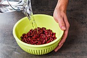 Kidney beans being soaked in water