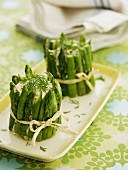 Fish salad wrapped in asparagus