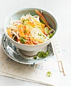 Vegan oriental rice noodle salad with carrots and ginger