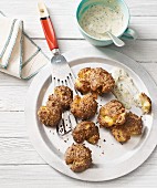Oven-roasted, squashed spiced potatoes with a vegan tofu mayonnaise