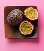Passion fruits in a wooden dish