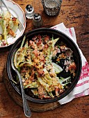 Fennel gratin with bacon and spring onions