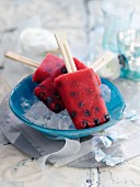 Melon and blueberry ice lollies