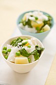 Cod with potatoes, peas and spinach