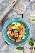 Diced marinated salmon with cucumber