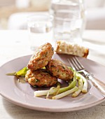 Fried veal cakes with spring onions