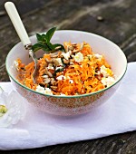 Carrot salad with sunflower seeds and sheep's cheese