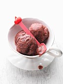 Vegan cherry ice cream with poppy seeds (made from almond milk)