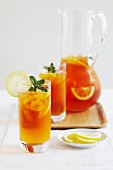 Iced redbush tea with blood oranges and mint