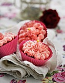 Pink cupcakes decorated with gold pearls