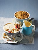 Apple and raspberry crumble with vanilla sauce