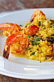 Saffron rice with shrimps, porcini mushrooms and cherry tomatoes