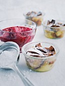Rhubarb compote with Ofenschlupfer (baked layered apple dessert) and a sieve of icing sugar