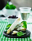 Filo pastry rolls filled with spinach and feta cheese
