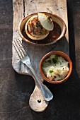 Stuffed onions in a beer sauce with mashed potatoes