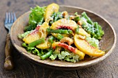 Green bean salad with peaches, nuts and grated coconut