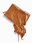 A piece of melted chocolate