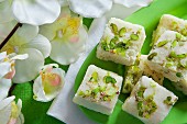 Kalakand with pistachios (sweets made from cream cheese and milk, India)
