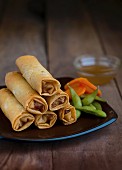Deep fried spring rolls with edamame beans and carrots