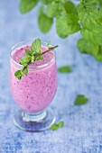 Pink berry smoothie with fresh mint