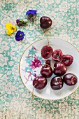 Fresh cherries on an old plate
