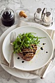 Beef steak with a rocket salad and balsamic dressing