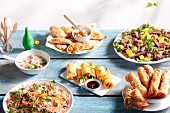 Spring rolls, patties and salads