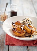 Grilled peaches with vanilla ice cream and chocolate sauce