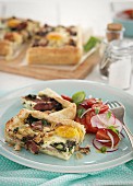 Puff pastry slices with bacon and fried egg