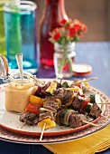 Beef skewers with peppers and courgettes