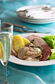 Bollito misto (meat stew with a herb sauce, Italy)