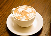 A cappuccino with decorative foam