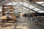 Converted greenhouse with dining area in foreground