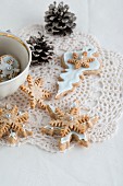 Christmas biscuits for decorating the tree on a crocheted doily