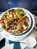 Steak salad with mushrooms