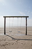 Simple set of swings on beach